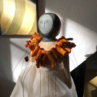 cloth doll with beads