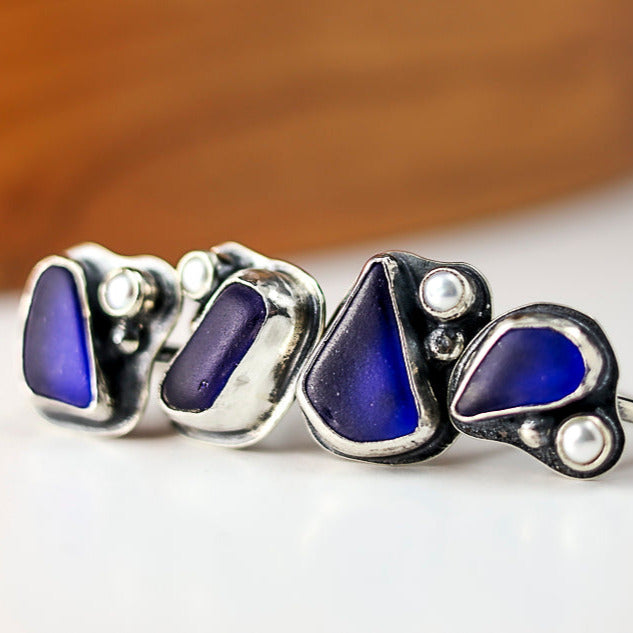 Silver rings with blue beach glass and pearl
