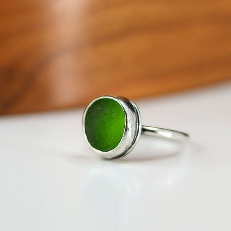Silver ring with green beach glass