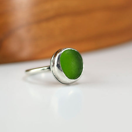 Silver ring with green beach glass