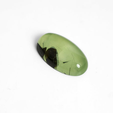 Green and black prehnite cabochon stone