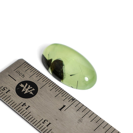 Green and black prehnite cabochon stone