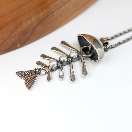 silver fish pendant with pearls
