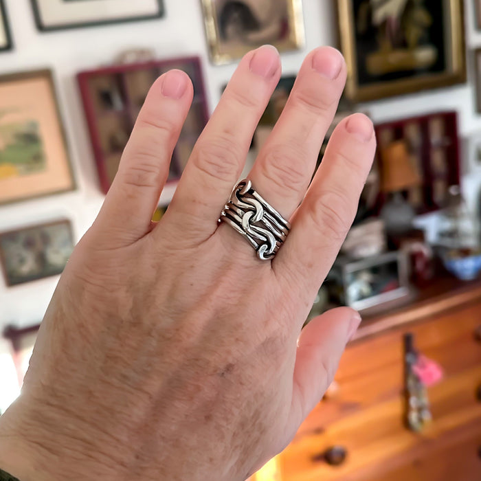 sterling silver triple knot ring on hand