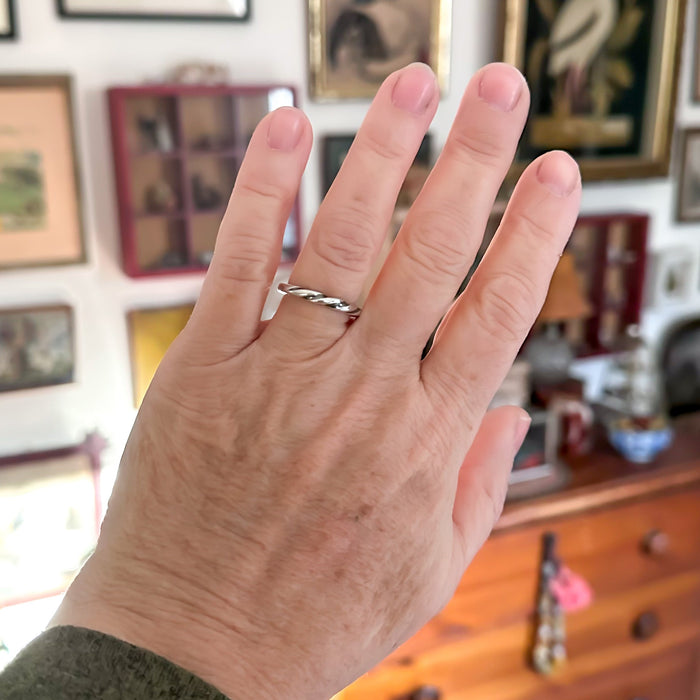 sterling silver twisted ring on hand