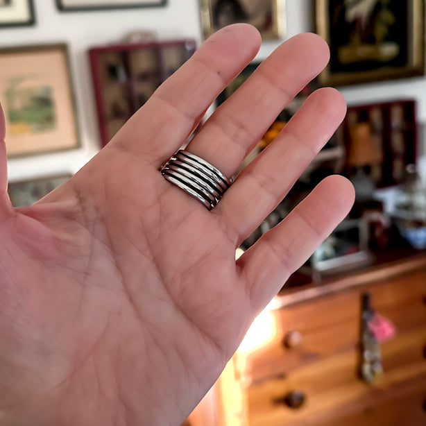 sterling silver knot ring on hand