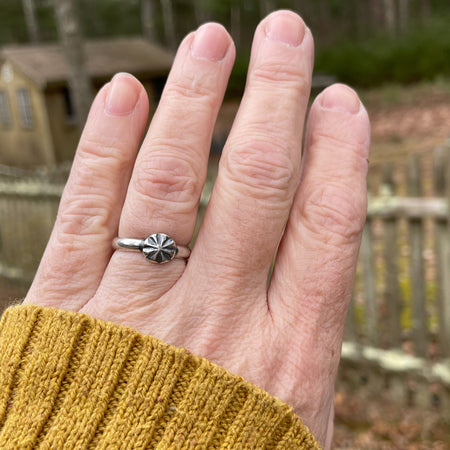 sterling silver stacking ring on hand