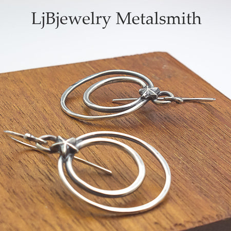 silver star and hoop earrings