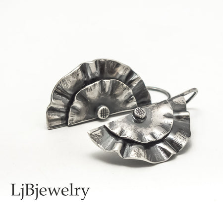 sterling silver wavy dangle earrings