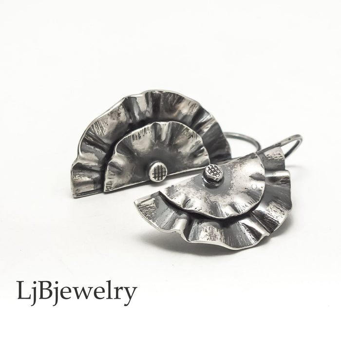 sterling silver wavy dangle earrings