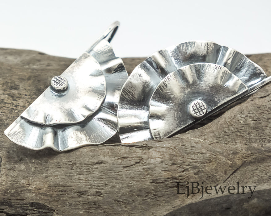 sterling silver wavy dangle earrings