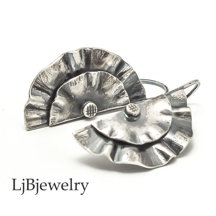 sterling silver wavy dangle earrings