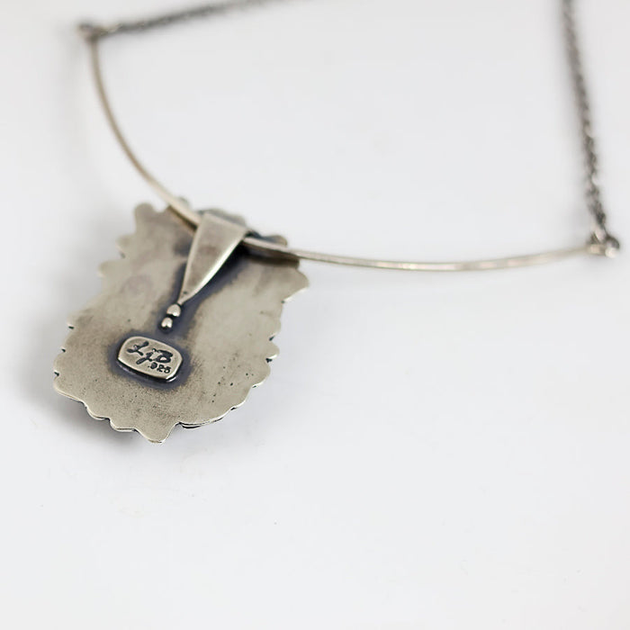 sterling silver pendant with beach stones