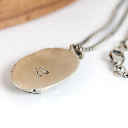 sterling silver pendant with beach stone