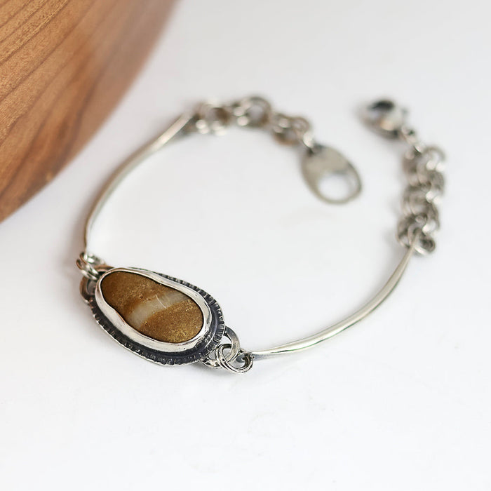 Handmade sterling silver beach stone bracelet with curved bar and chain, oxidized patina, 7.5 inches, made on Cape Cod