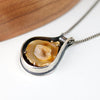 sterling silver and 14k gold pendant with an agate slice