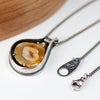 sterling silver and 14k gold pendant with an agate slice