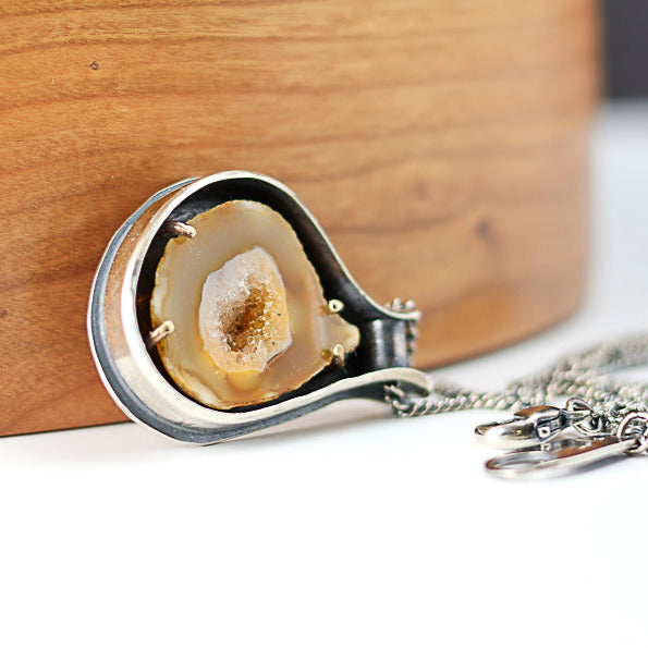 sterling silver and 14k gold pendant with an agate slice