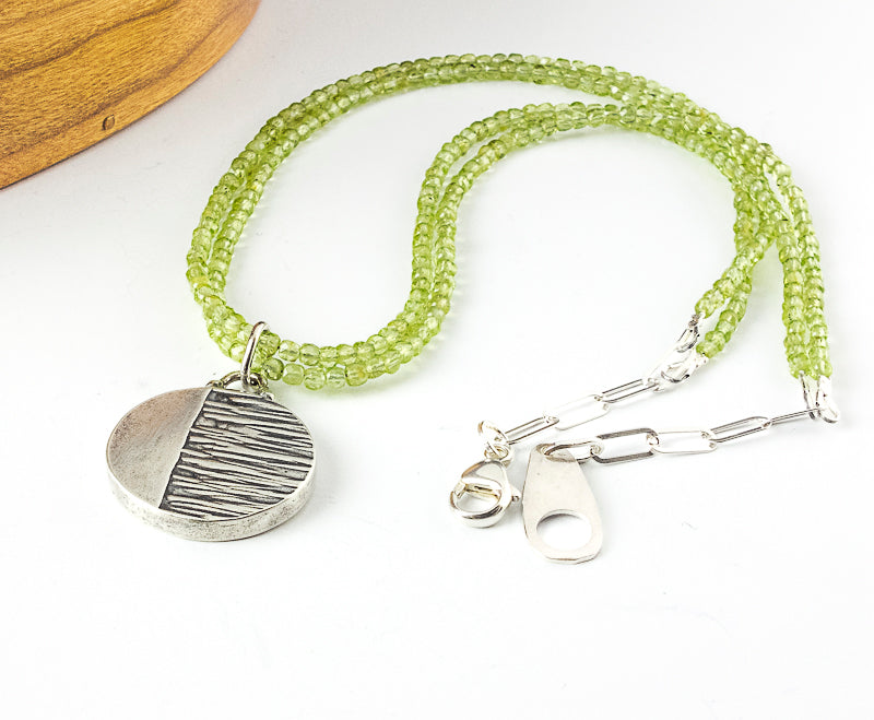 peridot beaded necklace with sterling silver hollow form