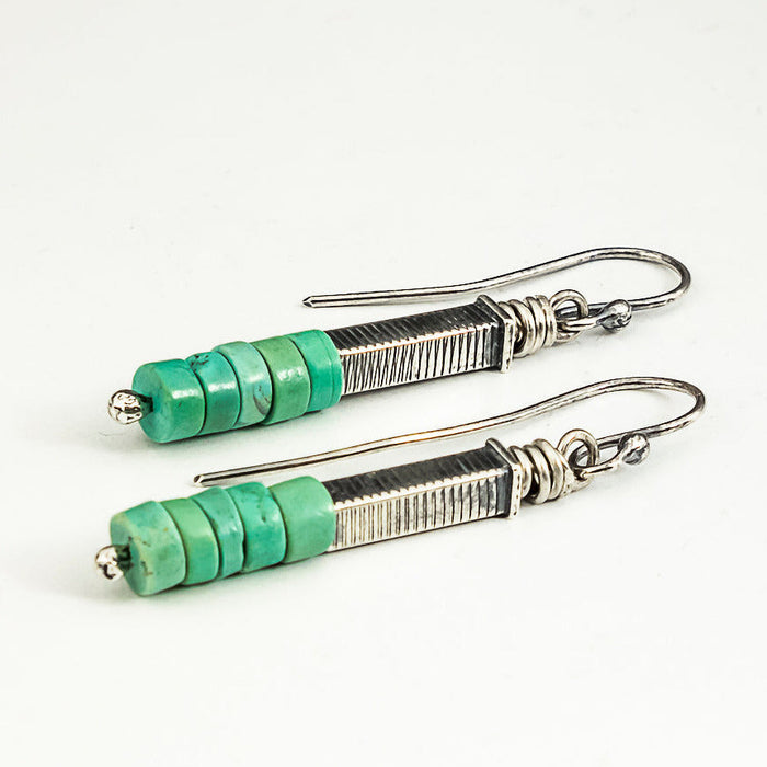 turquoise earrings with line texture