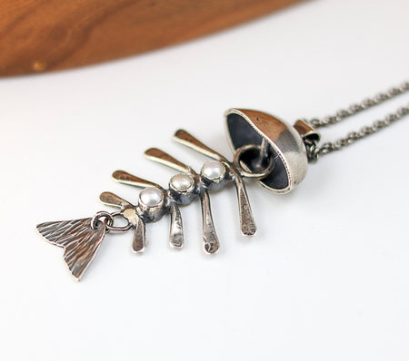 silver fish pendant with pearls