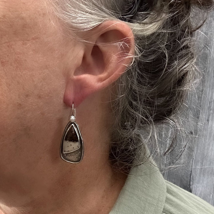 silver pearl and fossil earrings
