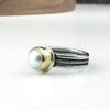 silver and gold pearl ring