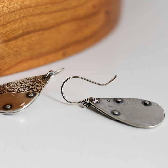 silver dangle earrings with texture