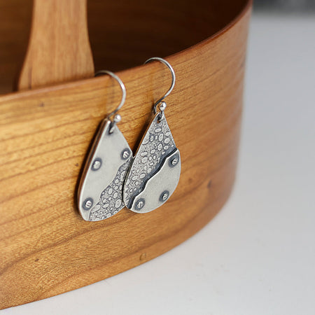 silver dangle earrings with texture