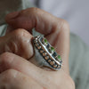 Sterling silver saddle ring  on a hand with three Sonora Gold turquoise teardrops from Mexico, hollow form and silver granules, sand texture, handmade by LjB Jewelry