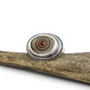 Silver ring with fordite cabochon