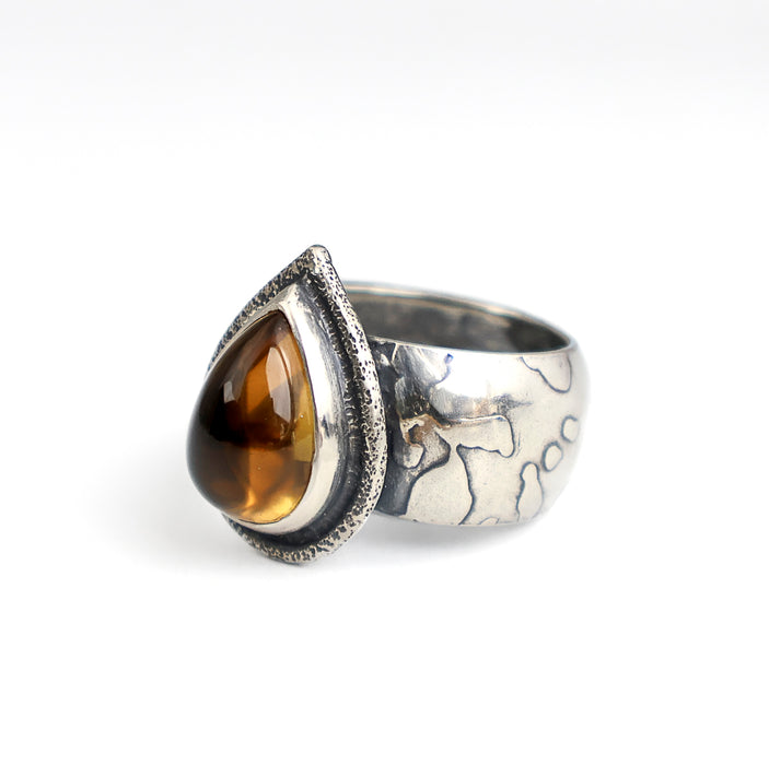 Handmade sterling silver ring with high dome teardrop Namibia citrine, sand textured bezel frame and wide textured dome band with oxidized patina, size 9