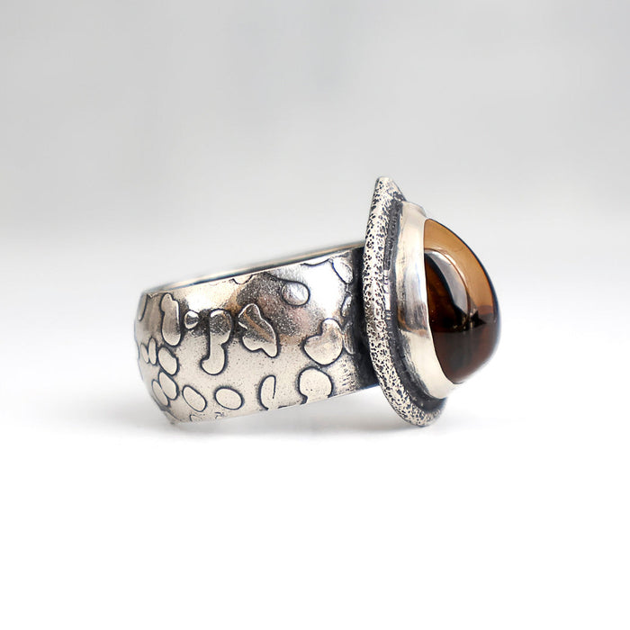 Handmade sterling silver ring with high dome teardrop Namibia citrine, sand textured bezel frame and wide textured dome band with oxidized patina, size 9