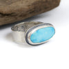 Sterling silver ring with soft blue Blue Ridge Orvil Jack turquoise from Nevada, wide band with dimpled edge texture, handmade by LjB Jewelry