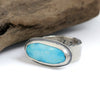 Sterling silver ring with soft blue Blue Ridge Orvil Jack turquoise from Nevada, wide band with dimpled edge texture, handmade by LjB Jewelry