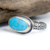 Sterling silver comfort fit ring with soft blue Blue Ridge Orvil Jack turquoise from Nevada, half round band with dimpled texture, handmade by LjB Jewelry