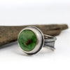 Sterling silver ring with bright green Emerald Valley turquoise from Nevada, tapered band with sand and line textures, handmade by LjB Jewelry