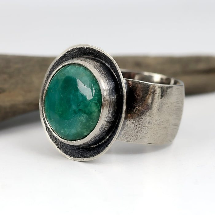 Sterling silver ring with Emerald Valley turquoise from Nevada, concave setting with sand texture, wide band, handmade by LjB Jewelry