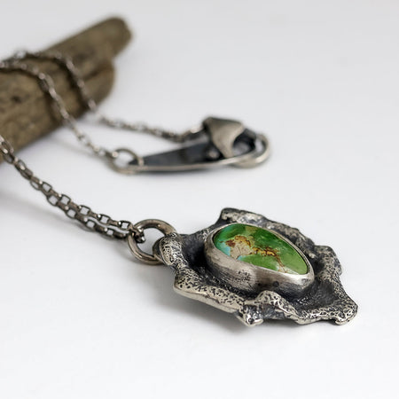 Sterling silver necklace with Sierra Bella turquoise from Sonora Mexico on reticulated silver base with free form edges, patina finish, handmade by LjB Jewelry