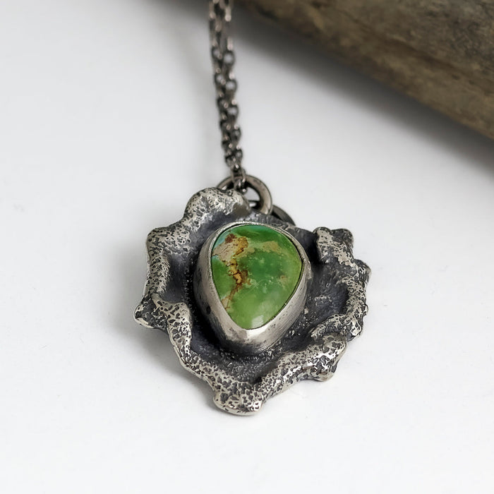 Sterling silver necklace with Sierra Bella turquoise from Sonora Mexico on reticulated silver base with free form edges, patina finish, handmade by LjB Jewelry