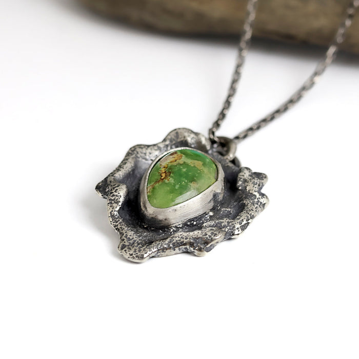 Sterling silver necklace with Sierra Bella turquoise from Sonora Mexico on reticulated silver base with free form edges, patina finish, handmade by LjB Jewelry