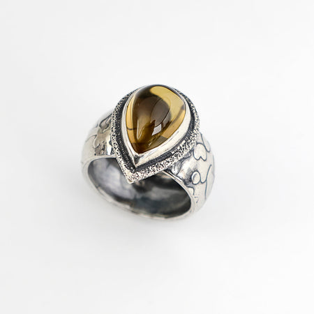 Handmade sterling silver ring with high dome teardrop Namibia citrine, sand textured bezel frame and wide textured dome band with oxidized patina, size 9