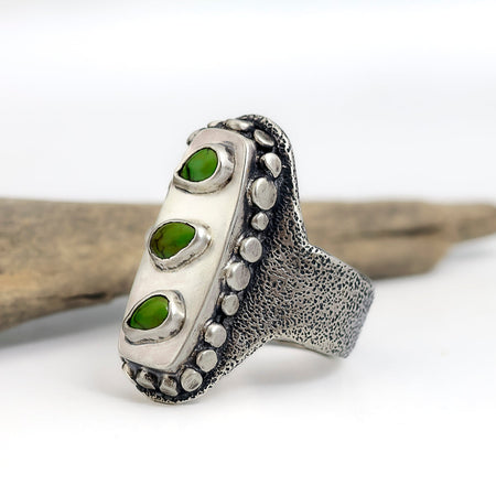Sterling silver saddle ring with three Sonora Gold turquoise teardrops from Mexico, hollow form and silver granules, sand texture, handmade by LjB Jewelry