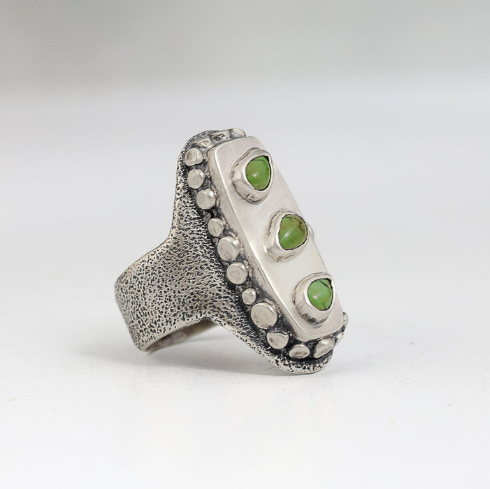 Sterling silver saddle ring with three Sonora Gold turquoise teardrops from Mexico, hollow form and silver granules, sand texture, handmade by LjB Jewelry