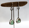 Sterling silver dangle earrings with green turquoise stones and hand textured square wire, handmade by LjB Jewelry