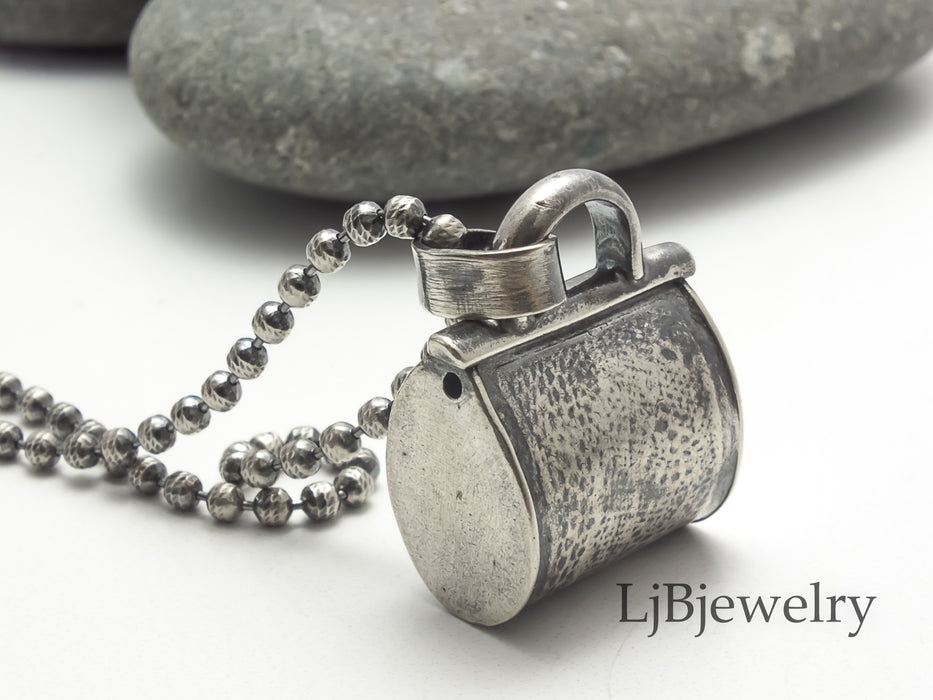 Silver purse pendant necklace