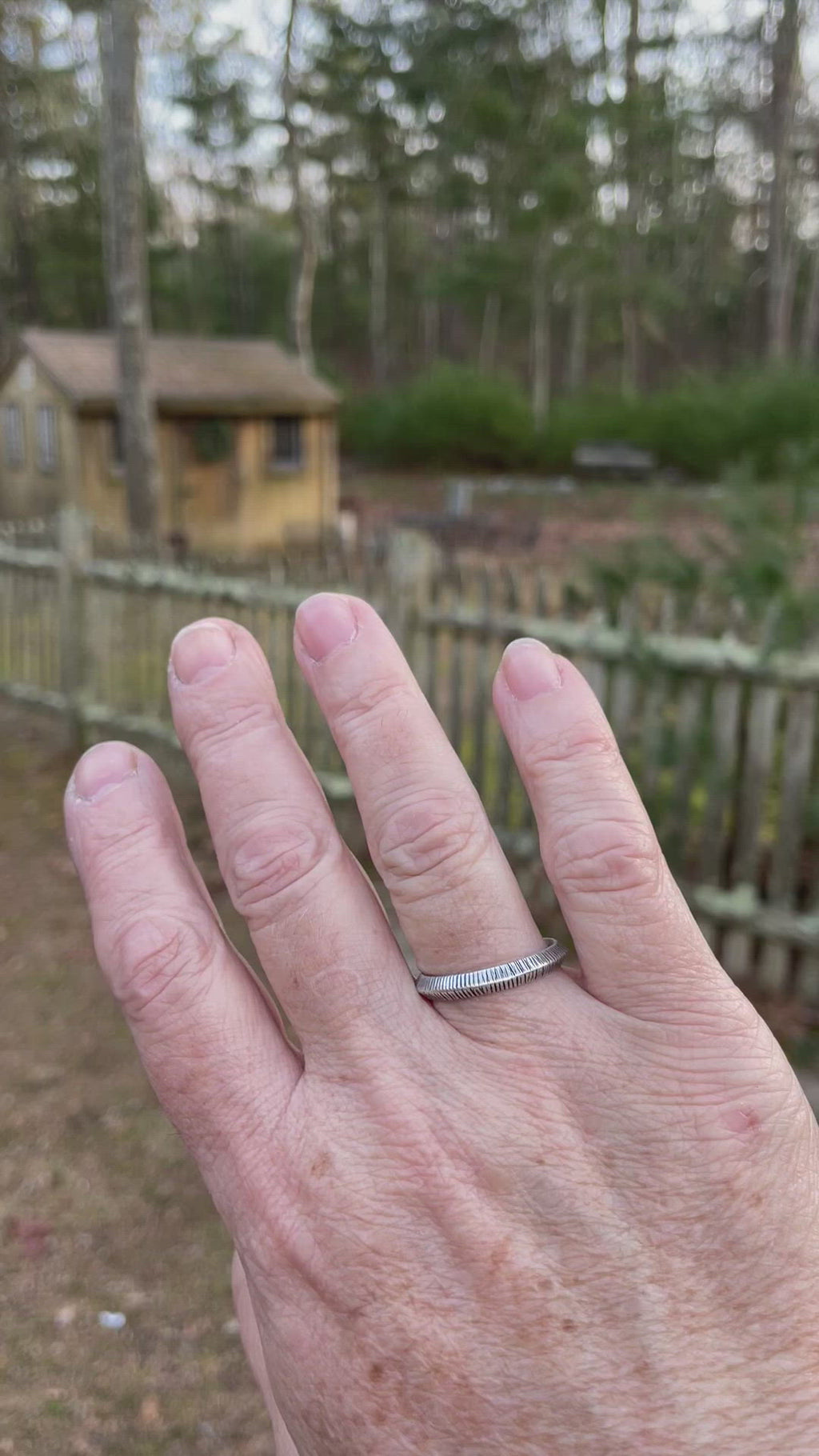 sterling silver textured stacking ring video on hand