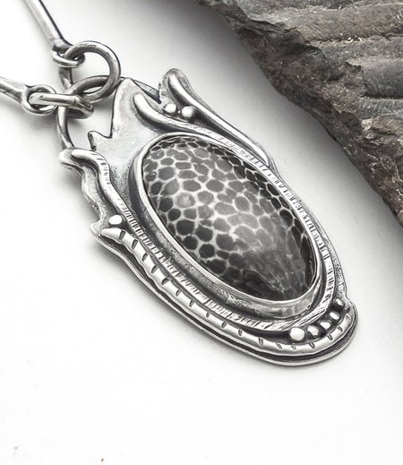 oval fossil stone pendant