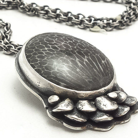 sterling silver fossil pendant