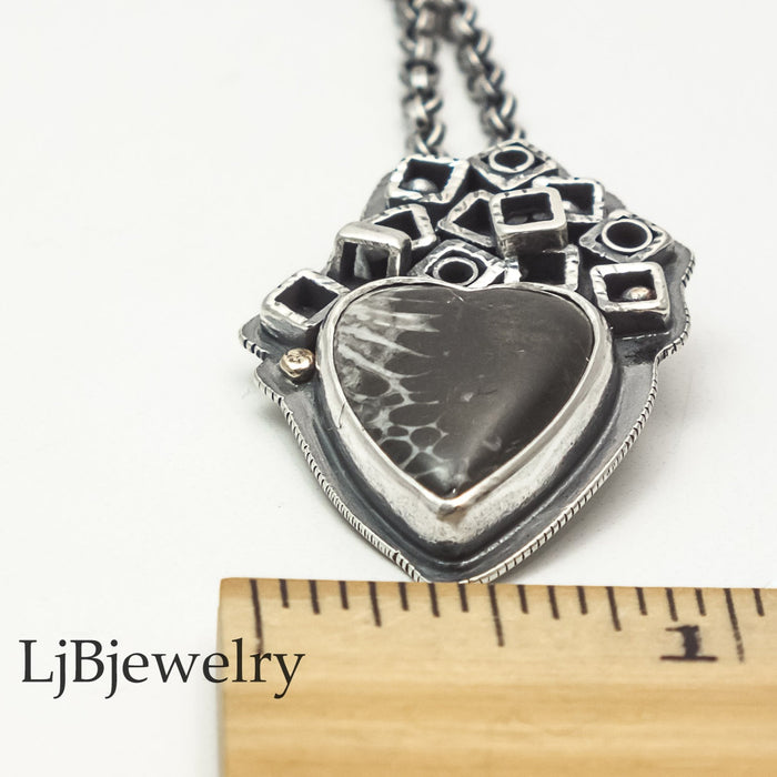 coral heart fossil sterling silver pendant